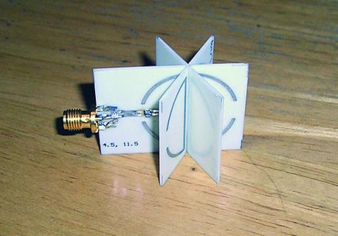 This experimental antenna developed by LGS Innovations mimics a spherical antenna by arraying circuit boards bearing printed structures. Without having a series of electrical connections, the boards nonetheless resonate as if the construct was a spherical antenna.