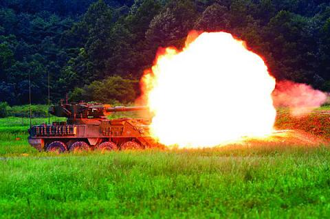 A tank fires during Wolfhound Maul. The event included a combined arms live fire exercise that simulated combat conditions in the most realistic manner possible. 