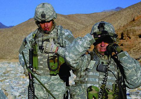 U.S. Army soldiers from the 10th Mountain Division (Light Infantry) call in a CH-47 Chinook helicopter for a mission in Bagram, Afghanistan. The 3rd and 4th Brigade Combat Teams will be the first Army units to deploy with Capability Set 13 equipment.