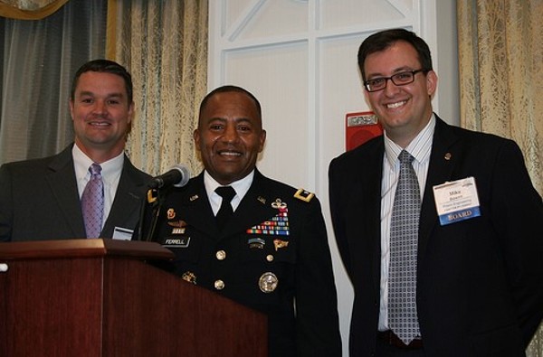 Together during the State of C4ISR event in October are (l-r) Tim Jahnigen, Maj. Gen. Robert Ferrell, USA, the commanding general of the Communications and Electronics Command, and Mike Bowen.