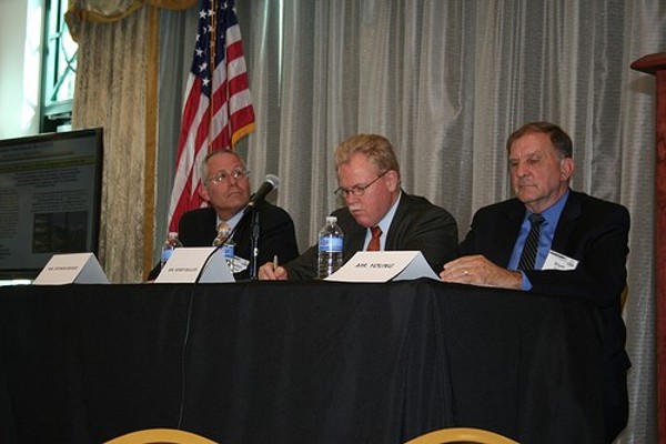 Steve Kreider (l), program executive officer for intelligence electronic warfare and sensors; Henry Muller (c), director of the Intelligence and Information Warfare Directorate; and Bryon Young, executive director of Army Contracting Command - Aberdeen Proving Ground, participate in a panel in October.