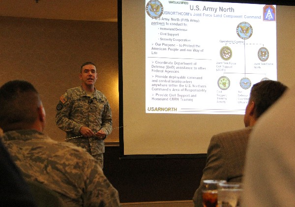 Col. John Cox, USA, G-6/chief information officer, U.S. Army North, discusses his commands domestic role and mission at the chapter's January luncheon.
