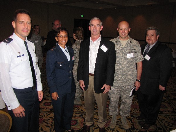 Joining together at the chapter's Young AFCEAN networking event in October are (l-r) mentors Col. Paul Welch, USAF; Col. Lisa Tucker, USAF; and Gary McAlum, chief security officer, USAA; and protégés Capt. Dave Sorrels, USAF; and Mike Bain.
