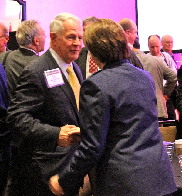 Lt. Gen. John Dubia, USA (Ret.), vice president of AFCEA International, thanks Maj. Gen. Suzanne Vautrinot, 24th Air Force commander, for her contributions at the closing of the chapter's third ACE in December.
