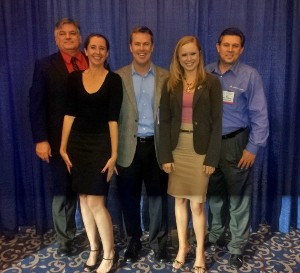 Chapter leadership gathering after the West award reception in January are (l-r) Kelley Crooks, regional vice president; Emily Rausch, Emerging Leader Award; Bill Morrow, chapter president; Bethany Reese, Regional Distinguished Young AFCEAN Award; and Bill Robinson, chapter vice president for programs. 