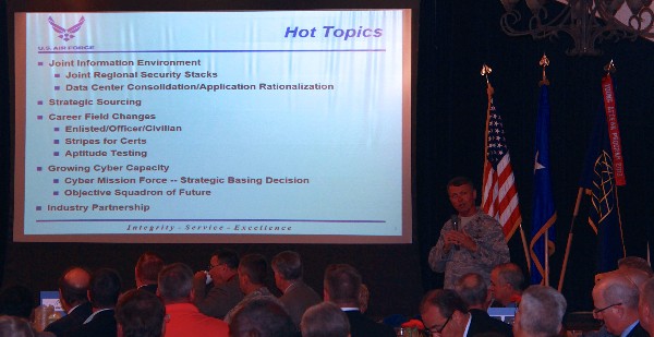 Maj. Gen. Earl Matthews, USAF, visiting San Antonio from the Office of the Secretary of the Air Force, discusses cyber initiatives with the Alamo chapter in June.