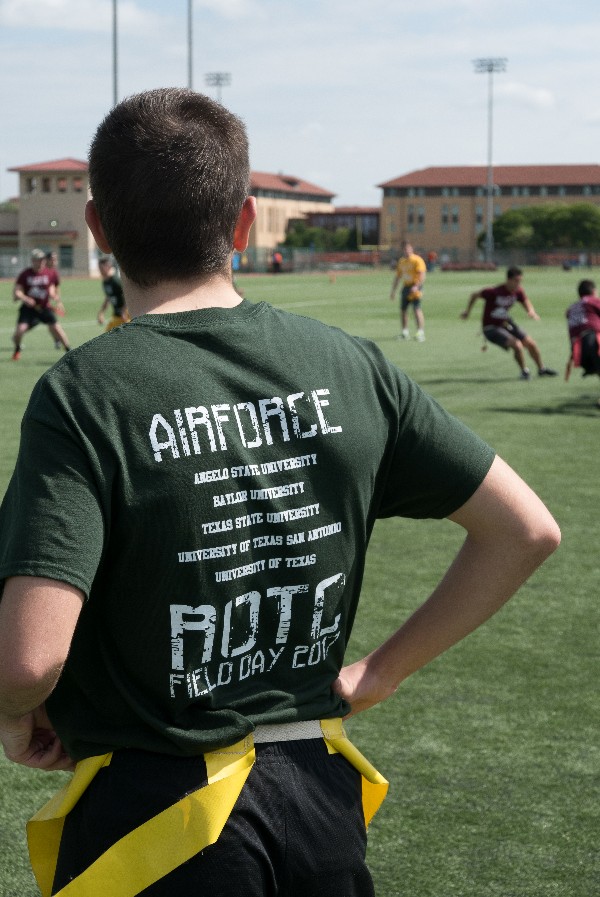 An ROTC cadet looks on as the teams fight it out for bragging rights and the coveted bomb trophy during this year's ROTC field day in April.