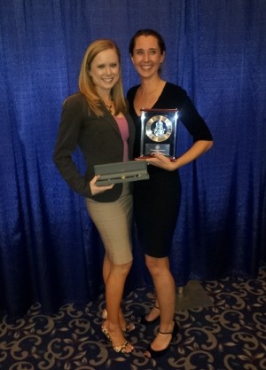 Bethany Reese (l), recipient of the Regional Young AFCEAN Award, and Emily Rausch, Emerging Leadership Award winner, display their awards at the West conference in January. 