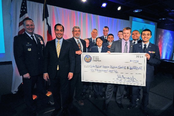Winners of the Sam Antonio Mayor's Cyber Cup Challenge - Service Division category from Medina Valley High School Air Force Junior ROTC are Estaban Elizondo, Ryan Porter, Michael Hall, Aydan Hamilton, Anthony Alvarado, John Perez and Destiny Perez, with coach Lt. Col. Bob Spracale (Ret.), USAF, Mayor Julian Castro, Col. Bill Poirier, commander, 67th Cyberspace Wing, and Morrow.