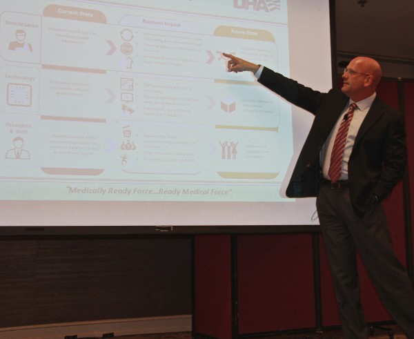 Dr. Peter Marks, acting chief operating officer for the Defense Health Agency Infrastructure and Operations Directorate, discusses the steps involved with deploying the new electronic health record concept during the Alamo chapter's July luncheon.