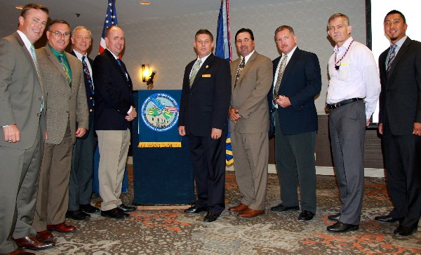 3) The Alamo Chapter thanked annual sponsors—who underwrite the costs of monthly events for government and military participants—in July. Pictured (l-r) are Morrow, Damien Heaney of Lockheed-Martin, Eric Stephens of LMI, Roger Williams of Diligent Consulting, chapter Vice President of Corporate Affairs Bill Robinson, Paul Hull of KGS, Rufus Dehart of SecureInfo, Scott Royse of NCI and Juan Toves of SRA International.