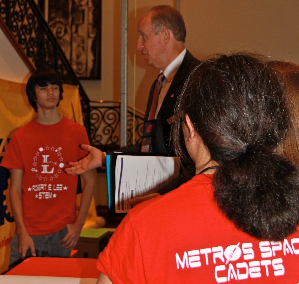 In December, Victor Helbling, chapter vice president of scholarships and education grants, chats with winners of the San Antonio BEST (Boosting Engineering, Science and Technology) robotics competition from Robert E. Lee High Schools STEM Academy, a magnet school in northeast San Antonio.
