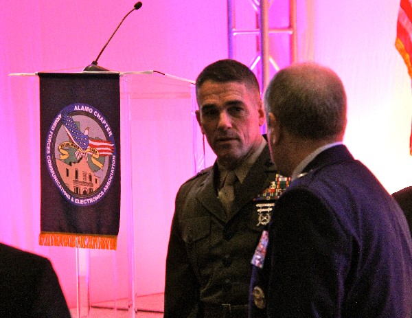 Brig. Gen. Kevin Nally, USMC, command, control, communications and computers (C4) chief, chats with Brig. Gen. Kevin Wooton, USAF, director of communications and information, Headquarters Air Force Space Command, at the Alamo ACE in December.