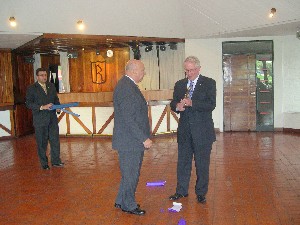 Maj. Gen Francisco E. Machinandiarena, EA (Ret.), chapter president, presGen. Dubia with a token of appreciation for his visit in April.
