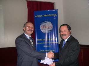 In September, Gen. Dimeglio (r) presents a certificate to Capt. Angel Palazzo, ARA, chapter board member, who spoke about command and control and intelligence, surveillance and reconnaissance at sea.