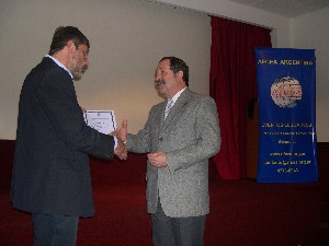 Maj. Gen. Norberto R. Dimeglio, FAA (Ret.) (r), chapter second vice president, presents a certificate of appreciation to Thill for speaking at the meeting in October.