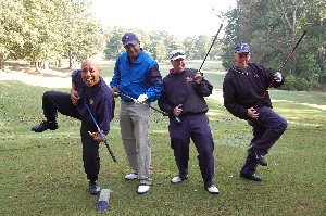 Participants in the chapter's October golf tournament and fundraiser enjoy the day. 