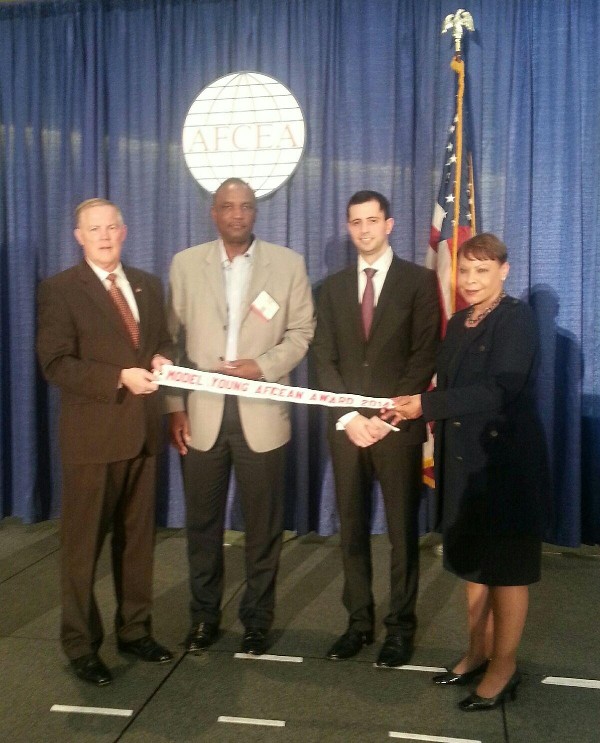 In February, Dan Shaer (2nd from r) and Alvie Johnson (2nd from l), chapter executive vice president, accept the Model Young AFCEAN Program Award on behalf of the chapter from Lt. Gen. Robert Shea, USMC (Ret.), AFCEA International president and CEO, and Linda Gooden, chair of AFCEA's board.