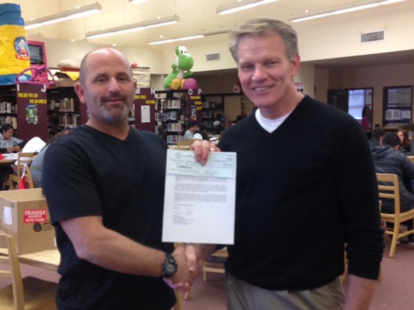 Alan Saltamachio, Fallbrook High School biology teacher (l), accepts a $500 Science Teaching Tools grant and congratulatory letter from Chapter President Mark Witzel at the April luncheon.