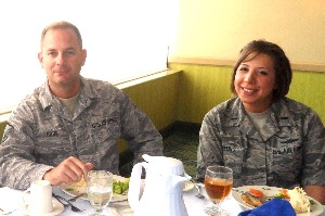 Master Sgt. Art Hare, USAF, and 1st Lt. Jessica Werling, USAF, both of the 45th Space Communications Squadron, await the November presentation.