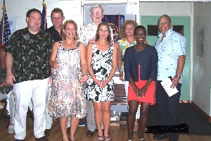 In October, Col. Lou Ramos, USAF (Ret.) (r), regional vice president, installs the 2009-2010 officers. From l-r are Glenn Exline, chapter president; Lt. Col. Dan Steele, USAF; Heidi Hughes, chapter director; J.P. Anderson, chapter director; Celeste Gushee, chapter vice president for membership; Debbie Roberson, chapter treasurer; and 2nd Lt. Brittany Carter, USAF, chapter secretary.