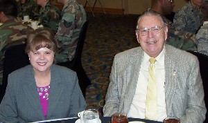 Sheryl Glore, chapter director and arrangements chair, joins Robert Rosequist, former regional vice president, for the March luncheon.