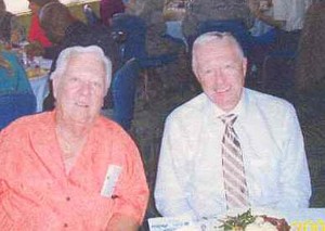 Arbe MacDowell (l), past chapter president, and Lou Linden, a director at L-3 Communications, network during the September meeting.