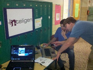 Nteligen employees Rob Wissmann (l) and Matt Ribboney provide students with a technology demonstration on behalf of the chapter in November.