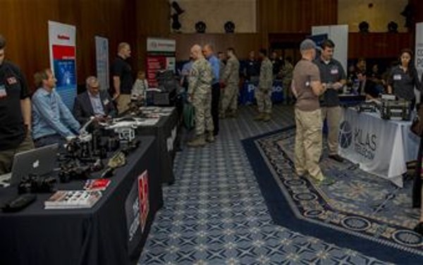 Technology industry representatives and community members interact during the Tech Expo in July at Club Eifel on Spangdahlem Air Base, Germany.