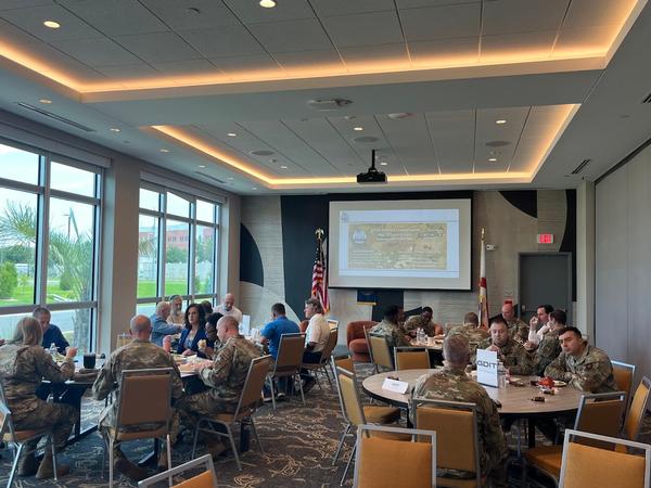 In May, attendees enjoy lunch and field questions to commanders from both Eglin and Hurlburt Air Force Base.