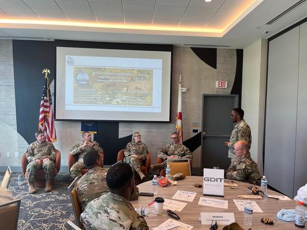In May, the Commander's Panel features (l-r) Col. Barry Roche, Air Force Special Operations Command/A6; Lt. Col. David Cote, commander, 96th Communications Squadron; Maj. Melanie Singer, commander 717th Information Operations Squadron; and Maj. Dan Langston, commander, 692nd Cyberspace Operations Squadron.