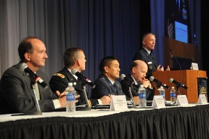 Panelists covering space and cyber at the November symposium are (l-r) Peter Sauve, director, Global Satellite Communications Support Center, U.S. Cyber Command; Col. Timothy R. Coffin, USA, deputy commander for operations, U.S. Army Space and Missile Defense Command/Army Forces Strategic Command; Brig. Gen. Gary C. Chun, USAF, director, Mission Operations Directorate, National Reconnaissance Office, and deputy commander, operations and interagency integration, Joint Functional Component Command for Space, U.S. Strategic Command; David Ferbrache, head of cyber policy and plans, Ministry of Defence, United Kingdom; and Brig. Gen. Kevin McLaughlin, USAF, deputy director, global operations, U.S. Strategic Command.