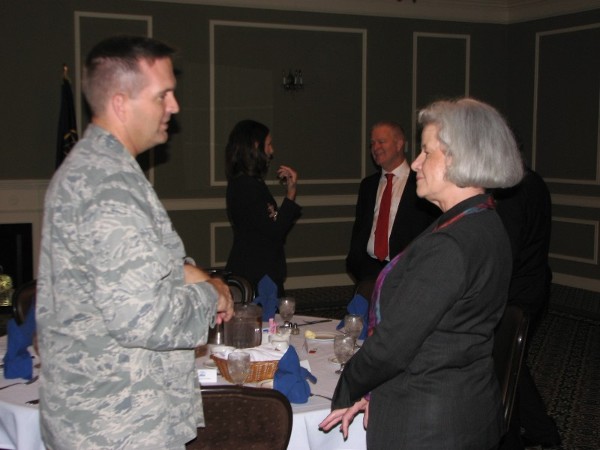 Col. Sean Murphy, USAF, commander, 55th Communications Group, Omaha, Nebraska, shares a moment before the September luncheon with Tracey.