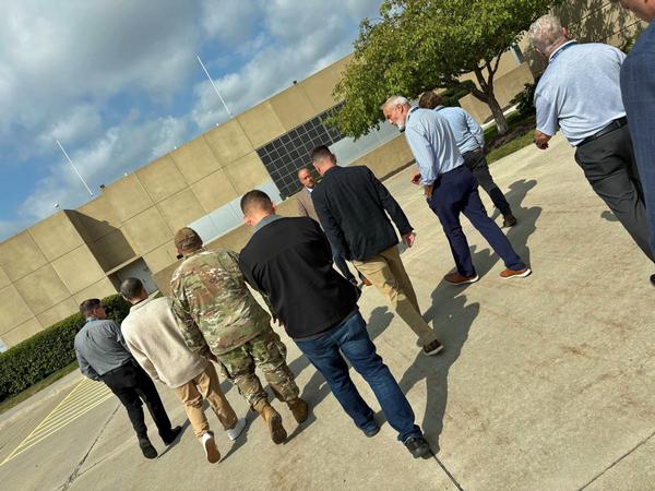 In September, Kenneth Moreano, president and CEO, Scott Data Center, Omaha, Nebraska, provides an overview of the center to the tour assembly before entering the facility.