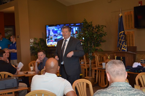 Robert W. Madden, deputy director, Global Shield Program Management Office, U.S. Strategic Command (STRATCOM), Offutt Air Force Base, addresses the chapter's TechNet Golf Tournament assembly in June on how the new STRATCOM facility is progressing and when it is projected for completion.