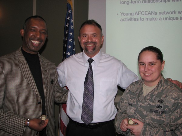 Randy White (l), chief of equal opportunity, 55th Wing, Offutt Air Force Base; Billy Cowgill, chapter vice president of diversity; and Staff Sgt. Tasha Ringdahl, USAF, take a moment to smile for the camera. White and Staff Sgt. Ringdahl were on hand at the January luncheon to make a short presentation on equal opportunity for all. Both received a chapter coin for their continued support of the chapter.
