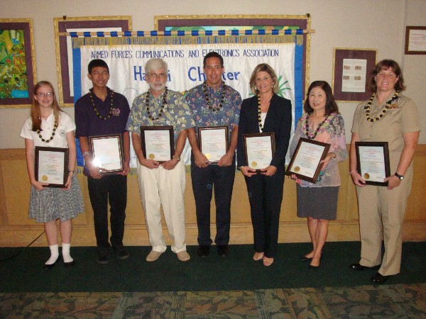 Award winners gathering in October are (l-r) Carolyn Morris, Kennedy Nabalta, Thomas Thornton, Steve Rodolfich, Kimberly Cortez, Beryl Morimoto and Cmdr. Ziemba.
