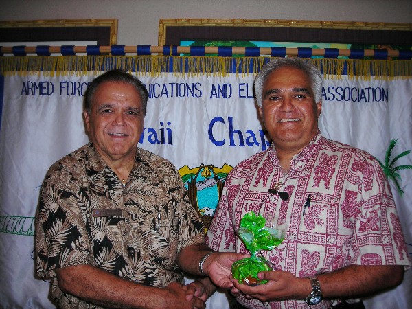 Cory Lindo, chapter president (l), thanks Sanjeev 