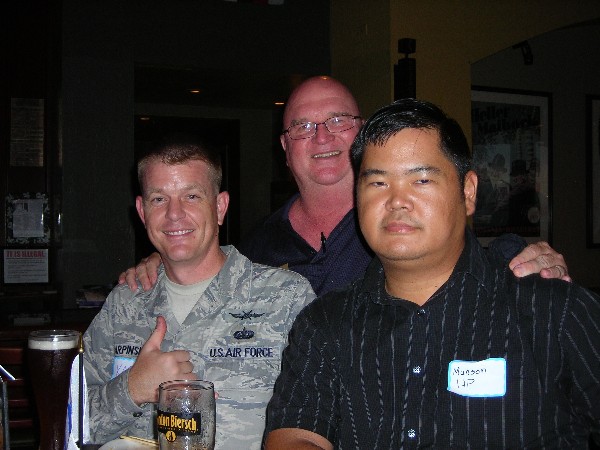 In November, networking at the Young AFCEAN event are (l-r) Tech. Sgt. Barry 'Karp' Karpinski, USAF; Lt. Col. Ed Ryglewicz, USAF (Ret.), regional vice president; and Munson Nakadomari of HP.