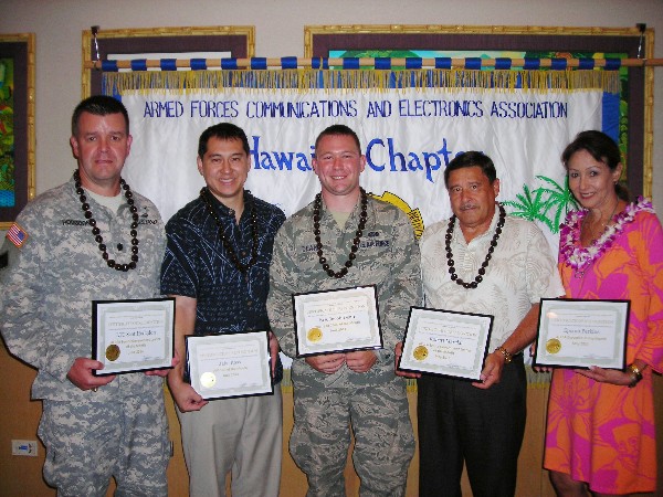 Award winners recognized at the June luncheon include (l-r) Senior Government Leader of the Month Lt. Col. Scot Hodgdon, USA; Young AFCEAN of the Month Senior Airman Jacob Dean, USAF; AFCEAN of the Month Jake Ross, Computer Network Defense section chief, U.S. Pacific Command; Bob Marcial, chief spectrum manager, U.S. Pacific Command J-613, Senior Government Leader of the Month for May; and Epooni Perkins, director of sales for national accounts, Hilton Hawaiian Village Beach Resort & Spa, Executive of the Month for May.