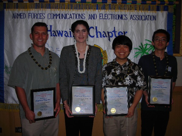 Award recipients at the April luncheon are (l-r) James Muller, HP, Young AFCEAN of the Month; Paola Saibene, State of Hawaii, Senior Government Leader of the Month; and Blake Tsuzaki of Iolani School and Stephen Mau of Mililani High School, Students of the Month.