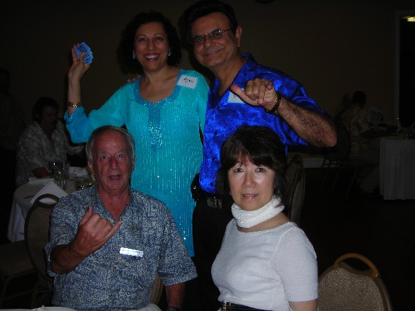 Together at the October celebration are (top row, l-r) Alka and Vino Mehta along with (bottom row) Bill and Setsuko Crawley.