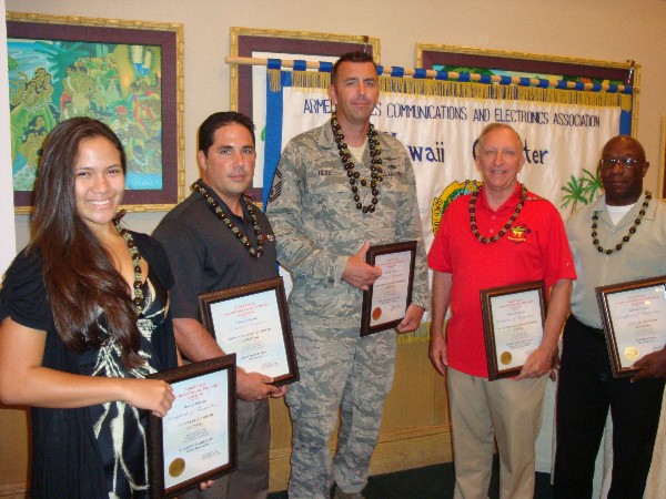 Award winners at the August meeting are (l-r) Puamana Danielson, Student of the Month; Daren Presibero, Young AFCEAN of the Month; Senior Master Sgt. Michael Herr, USAF, Senior Government Leader of the Month; Chaplain Steven Jessen, July Senior Government Leader of the Month; and Ruffin.