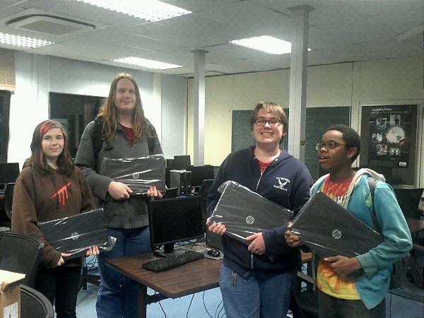 Students from the CyberPatriot team at Ramstein High School in Germany receive new laptops thanks to the support of chapter sponsor CDW-G. 