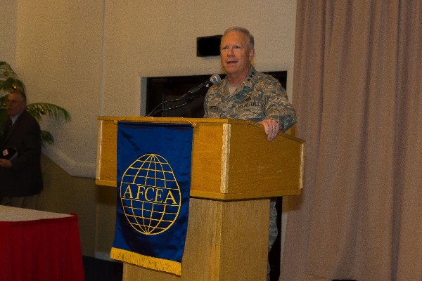 Special guest Lt. Gen. John Thompson, USAF, commander, Air Force Life Cycle Management Center offers best wishes to guests at the holiday social in December. 