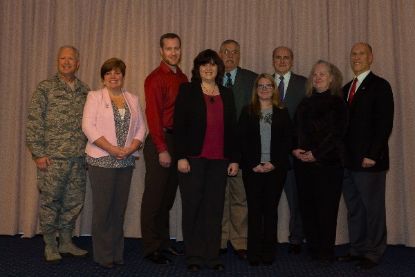 Lt. Gen. John Thompson, commander, Air Force Life Cycle Management Center (AFLCMC) (far left) joins Bud Vazquez, New England-Upstate New York regional vice president (far right) in congratulating Hanscom Air Force Base and chapter 