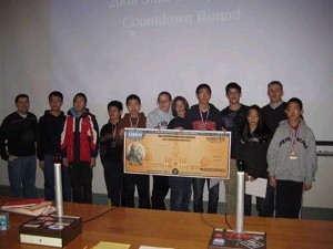 Capt. Dan Visosky, USAF (far l), and Matthew Heideman (2nd from r), members of the chapter's Young AFCEAN council, stand with the 10 finalists of the State of Massachusetts Mathcounts competition in March.