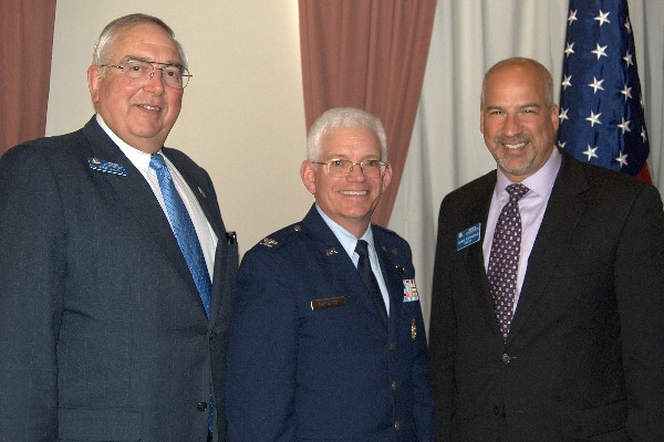 Col. William R. Hodgkiss, USAF (c), director of the Launch Systems Directorate, Space and Missile Systems Center, Air Force Space Command, Los Angeles Air Force Base, joins Dr. Steve Quilici (l), chapter president, and Adam Feingold, chapter vice president of programs, following the colonel's presentation to the chapter in April.