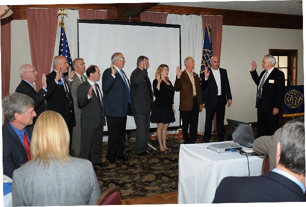 At the April membership luncheon, AFCEA Regional Vice President Doug Holker (r) installs the Los Angeles Chapter officers and directors for 2014 (from l): Bill Simon, vice president of publicity; Adam Feingold, vice president of programs; Steve Scott, vice president of membership; Spence Bauer, director and past president; Steve Quilici, president; Ed Peura, vice president of finance; Andrea Loper, secretary and vice president, Young AFCEAN Affairs; Steve Staso, vice president of communications; and Evan Helmy, vice president of operations.