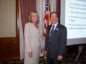 Spence Bauer, chapter vice president for programs, thanks Joy M. White, director of contracting, Space and Missile Systems Center, Los Angeles Air Force Base, for her presentation on future innovations and changes to improve the contracting process. White served as the guest speaker at the September meeting.